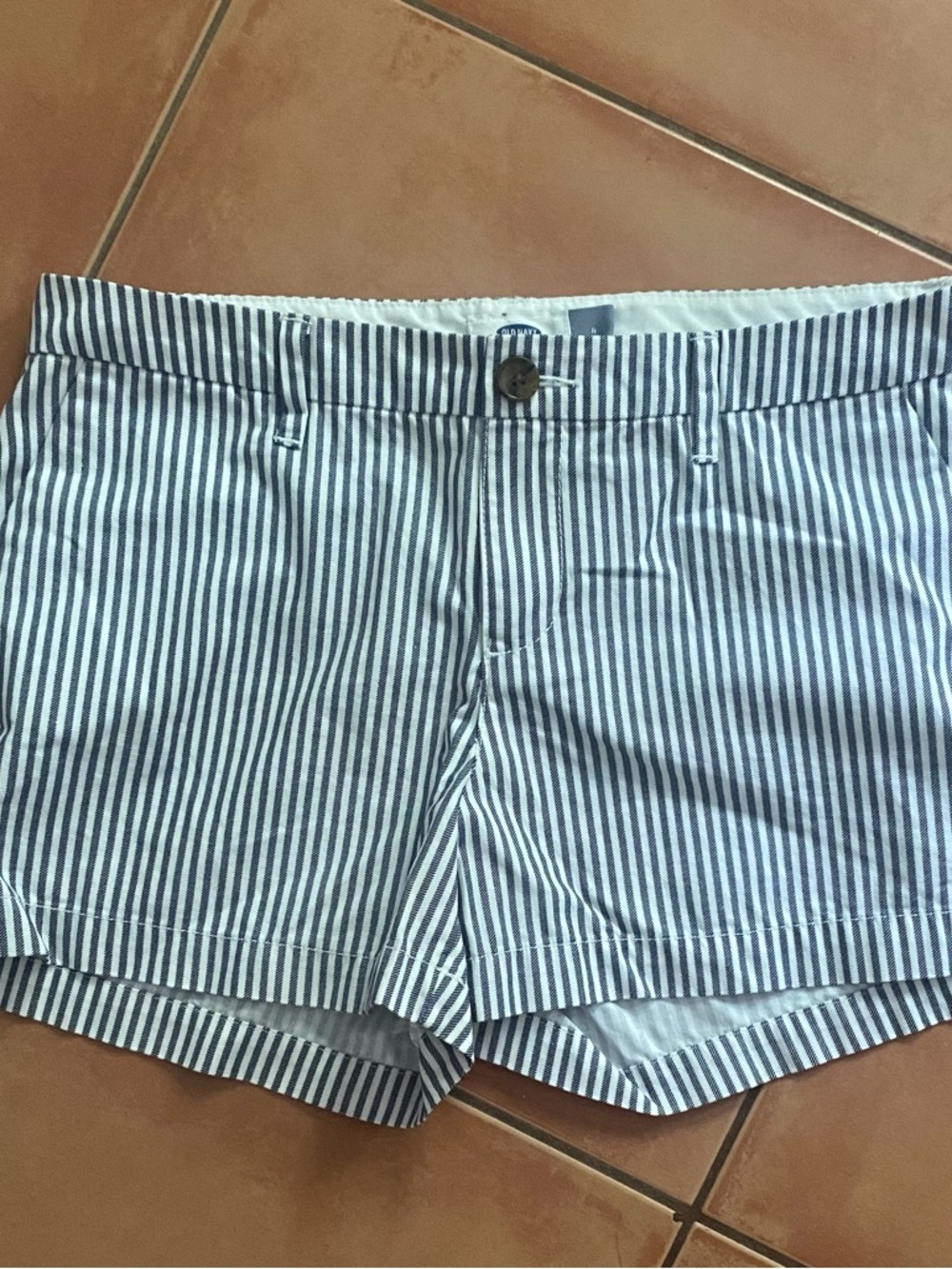 OLD NAVY SHORTS. SIZE 4. BRAND NEW WITH TAG.  COLOR IS BLUEISH/GRAY